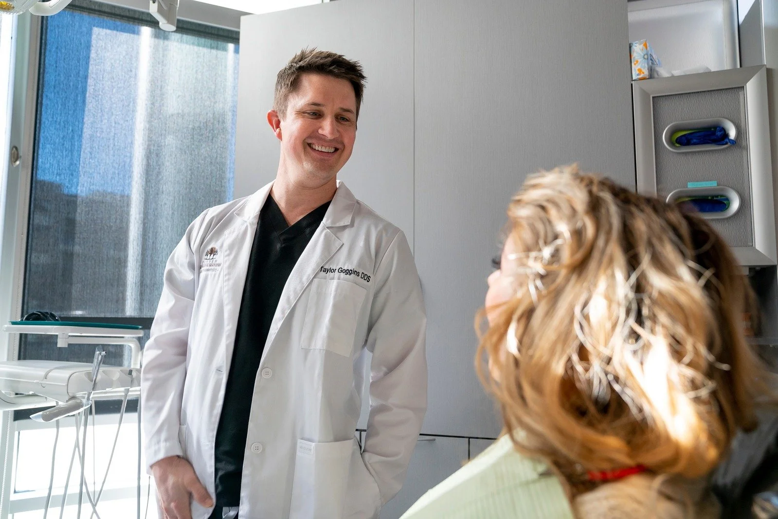 Doctor welcoming patients